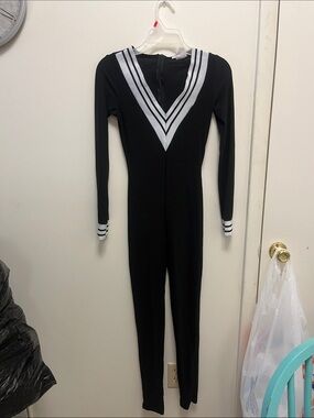 Fashion Nova Black Jumpsuit with White V-Stripe Detail